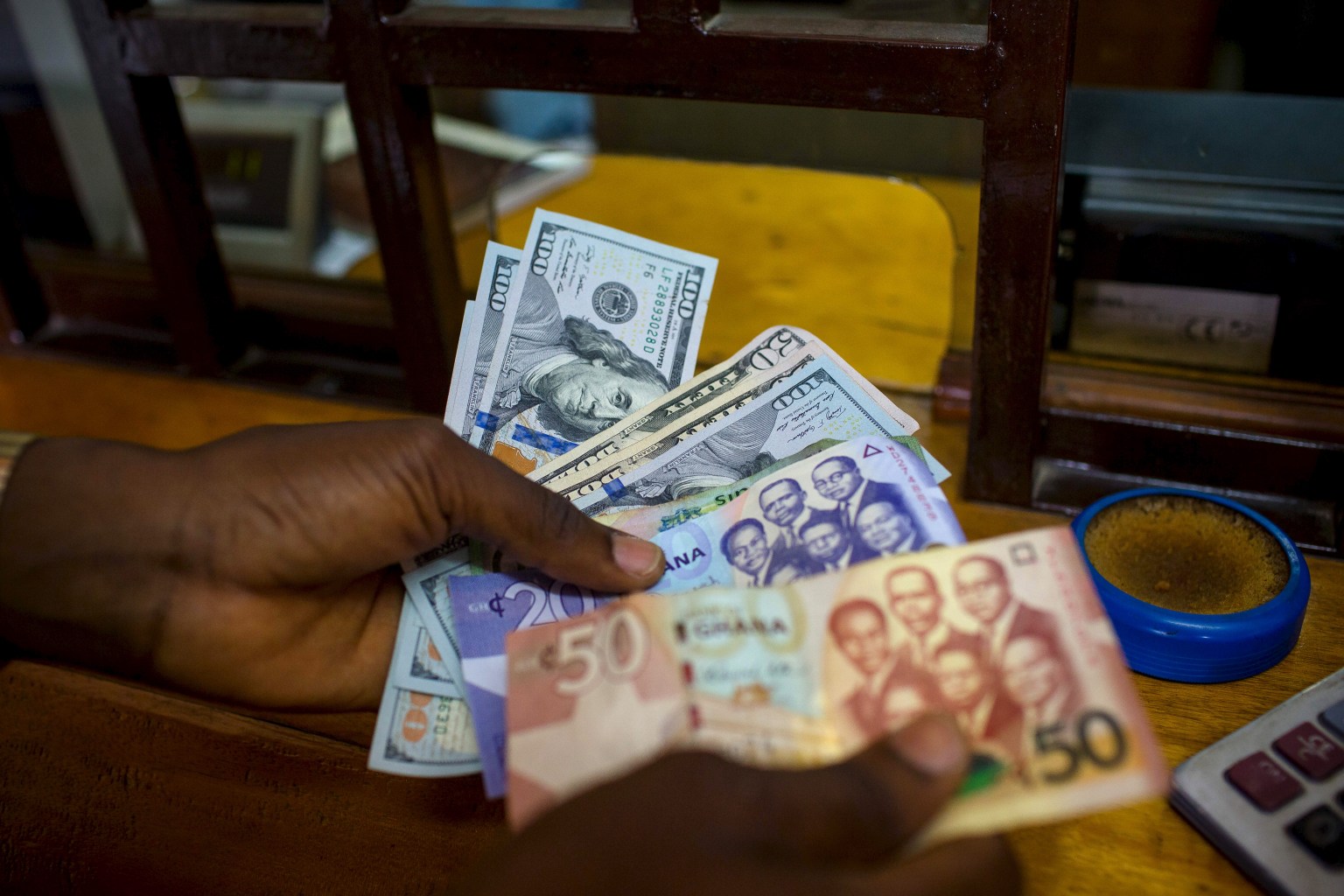 Ghana Cedi Depreciates 74% Against the Dollar in Three Years, Risks Loom for 2024